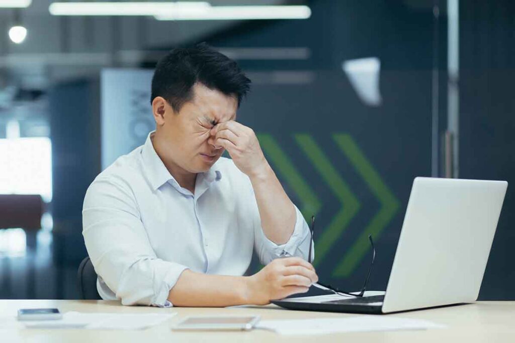 Man at work with dry eyes